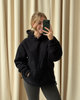 Black oversized nursing fleece hoodie, front view
