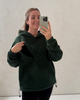 Forest green oversized nursing fleece hoodie with the discreet nursing zip open