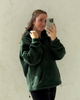 Forest green oversized nursing fleece hoodie, side view