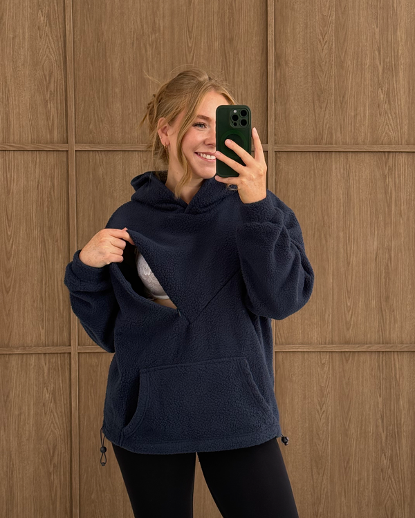 Navy oversized nursing fleece hoodie with the discreet nursing zip open